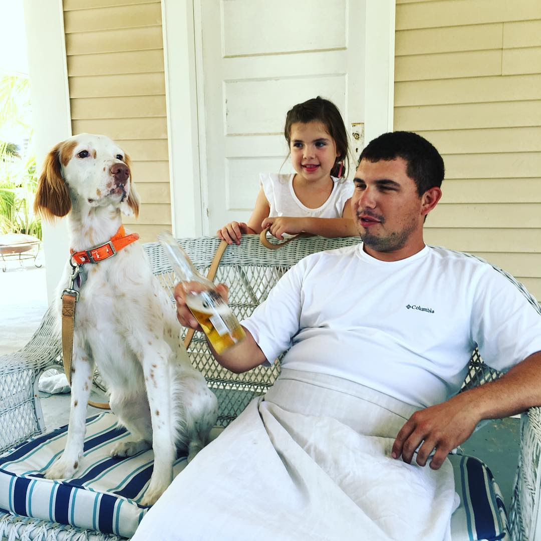 A boy, his dog and his niece. Apparently Ivy prefers domestic brews