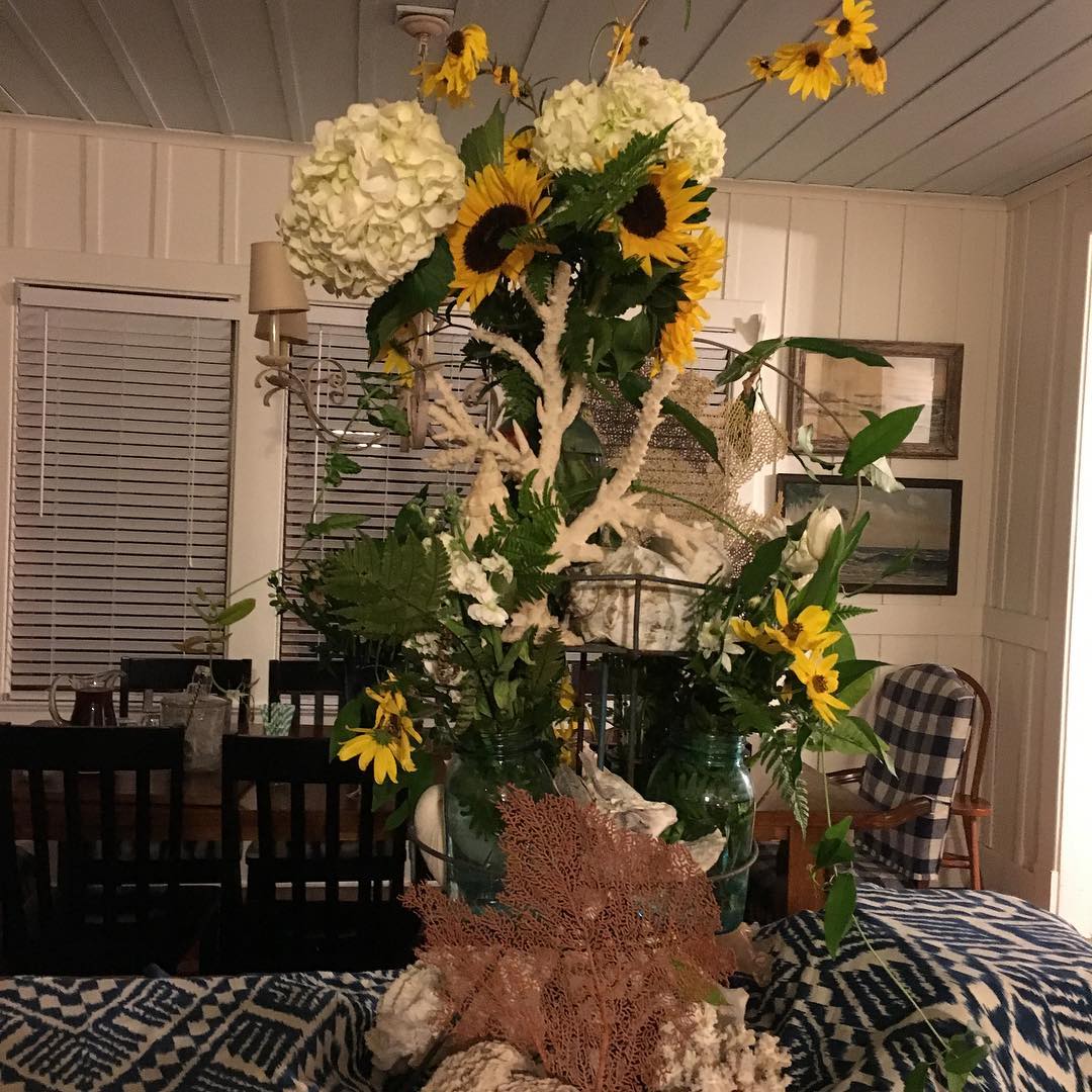Some flowers and ferns and vines from the garden, plus some supermarket blooms plus my $6 thrift store shower curtain for the buffet table for a fun bridal shower st Ebbtide tonight